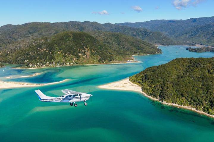 a body of water with a mountain in the background